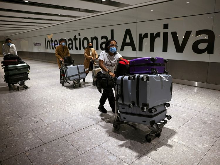 Stock London Heathrow Airport UK Britain passengers