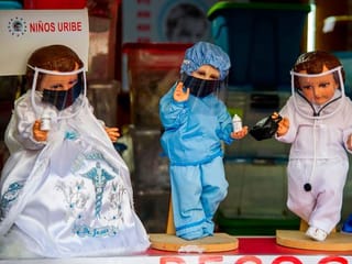 Photos: Baby Jesus dolls help raise COVID-19 awareness in Mexico