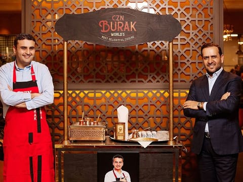 Rizgar Sak (right), Chairman of Dives Holding, which operates CZNBurak, with chef Burak Ozdemir 