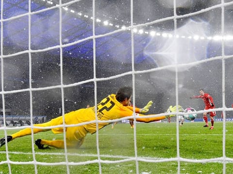 Bayern Munich's Robert Lewandowski saw his penalty saved but they German champions still defeated Hertha Berlin