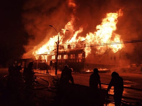 A Municipality building in Panguipulli is set on fire by protesters during a demonstration over the murder of a street artist killed by the local police, in Panquipulli. 