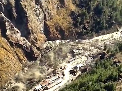 Picture shows a massive flood of water, mud and debris flowing at Chamoli District after a portion of Nanda Devi glacier broke off in Tapovan area of the northern state of Uttarakhand. 