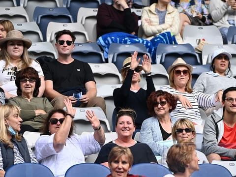 Fans watch the first round match between Canada's Bianca Andreescu and Romania's Mihaela Buzarnescu. 