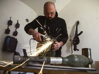 Changing the tune: Serbian artist turns weapons into instruments