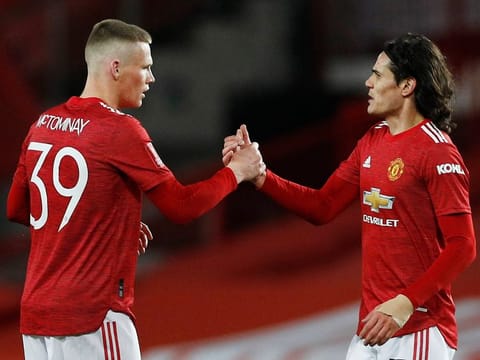 Manchester United's Scott McTominay celebrates with Edinson Cavani at the end of the match.