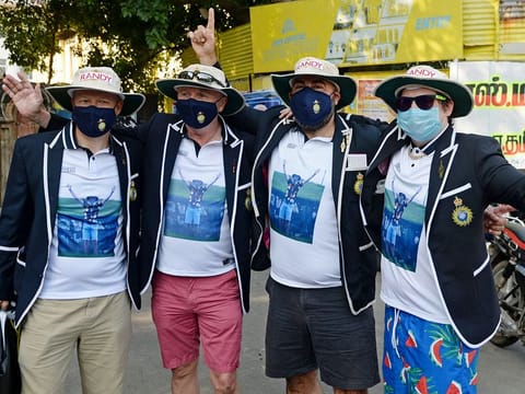 Barmy Army cricket fans gesture while cheering for England cricket team before the second Test match between India and England at the M.A. Chidambaram Cricket Stadium in Chennai on February 13, 2021. 