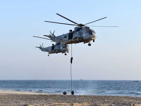 Pakistan Navy SEALs taking part in counter-terrorism drills at PNS Qasim, Manora, as part of the multinational maritime exercise Aman-21 in the Arabian Sea. 