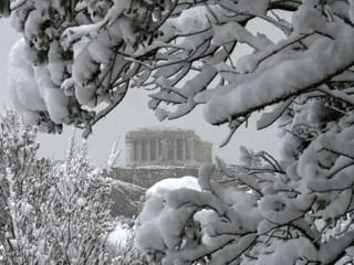 In pictures: Rare snow blankets Athens
