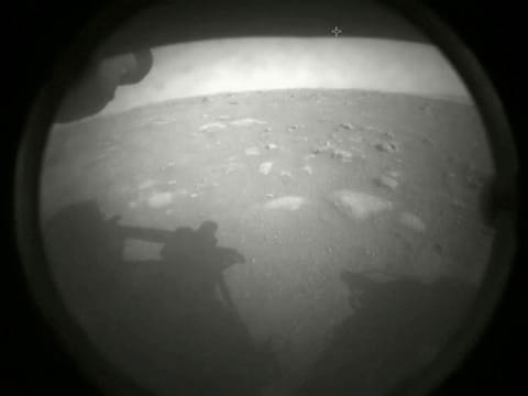 The first images arrive moments after NASA's Perseverance Mars rover spacecraft successfully touched down on Mars, at NASA's Jet Propulsion Laboratory in Pasadena, California, U.S. February 18, 2021. 