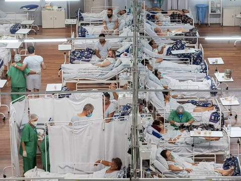 File image for illustrative purposes: COVID-19 patients lie on beds at a field hospital built inside a sports coliseum in Santo Andre, on the outskirts of Sao Paulo, Brazil, Thursday, March 4, 2021. 