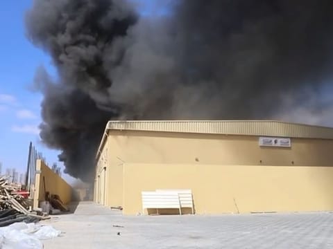 The warehouse on fire in Ras Al Khaimah.