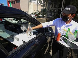 Photos: First 'car-in' restaurant service launched in Kuwait after dine-ins banned
