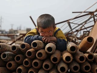 Photos: Syrian family sifts through old ammunition for a living