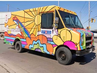 Canada Post's psychedelic trucks bring cheer amid COVID-19 gloom