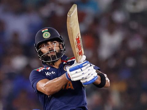 India's Virat Kohli hits a six to win the match against England in the second T20I, at Narendra Modi Stadium, Ahmedabad.   