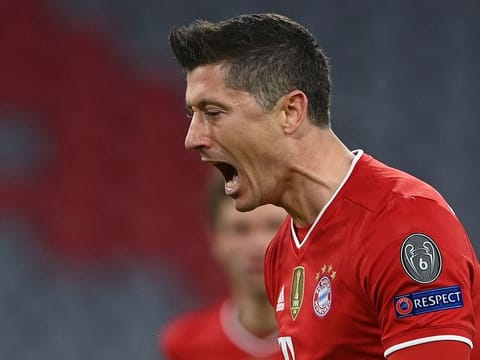 Bayern Munich's Polish forward Robert Lewandowski celebrates scoring the opening goal.