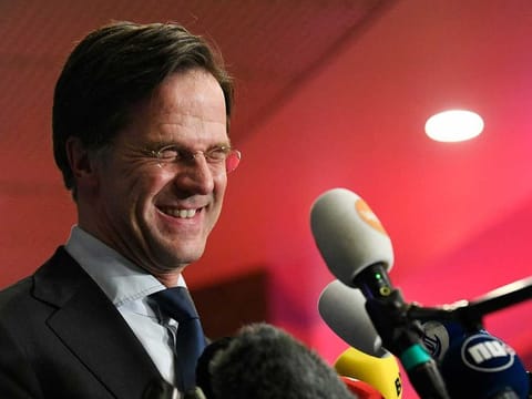 Outgoing Dutch Prime Minister Mark Rutte reacts to the exit polls of the House of Representatives' elections in The Hague, on March 17, 2021. Dutch Prime Minister Mark Rutte's party won the most seats in elections dominated by the coronavirus pandemic, putting him on course to lead his fourth coalition, exit polls said on March 17, 2021. 