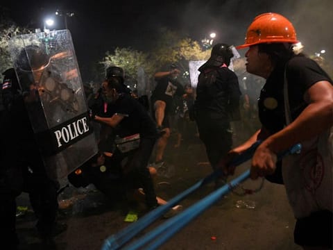 Demonstrators clash with riot police during an anti-government protest in Bangkok, Thailand.