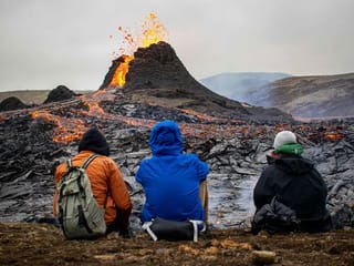 Photos: Thousands flock to Iceland's erupting volcano