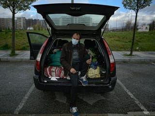 Photos: Cars become home for Spain's COVID-19 pandemic casualties 