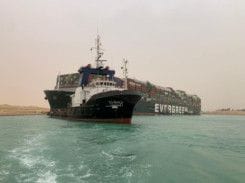 A container ship which was hit by strong wind and ran aground is pictured in Suez Canal, Egypt March 24, 2021.