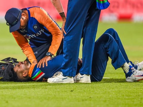 Shreyas Iyer writhing in pain after being injured while fielding during the first One-day International against England in Pune on Tuesday.