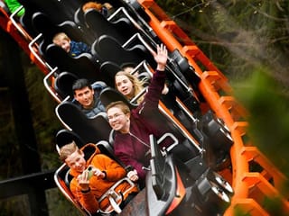 Photos: Roller-coaster rides for Dutch fans willing to get COVID-19 nose swab