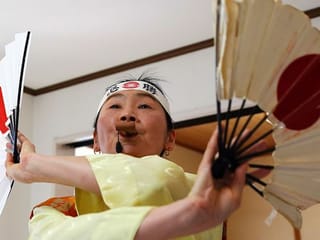 Photos: 'Super Fan' prepares for Tokyo Olympics without foreign fans