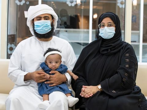 Emirati couple Fatema Omar and Ahmed Huseein Saleem with baby Latifa. 