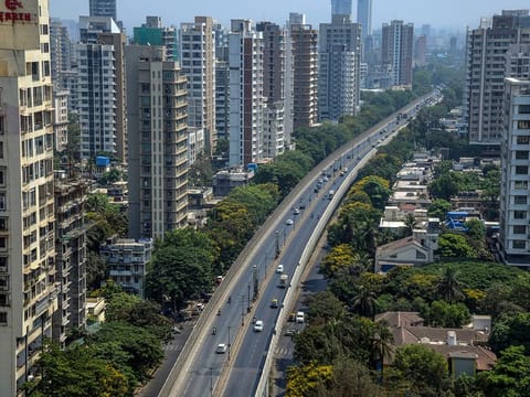 The streets of Mumbai, India. How can NRIs best decide on the right property in India? Here's all you need to know.