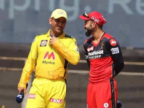 Mahendra Singh Dhoni (left), captain of the Chennai Super Kings, and Virat Kohli, captain of the Royal Challengers Bangalore, at the toss ahead of the IPL 2021 match in Mumbai on April 25, 2021.