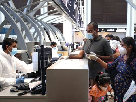 Passengers at the Muscat International Airport. Replacement of lost or damaged cards will incur a fee of 20 riyals. For illustrative purpose.