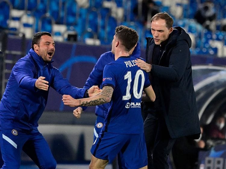 Pulisic is congratulated by Chelsea manager Tuchel for scoring against Real Madrid