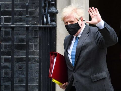 Boris Johnson departs 10 Downing Street in London on April 28, 2021.