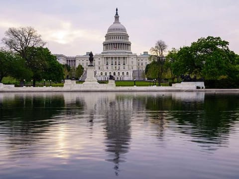The Capitol is seen in Washington, early Wednesday, April 28, 2021, as President Joe Biden prepares to address House and Senate lawmakers on his first 100 days in office. 