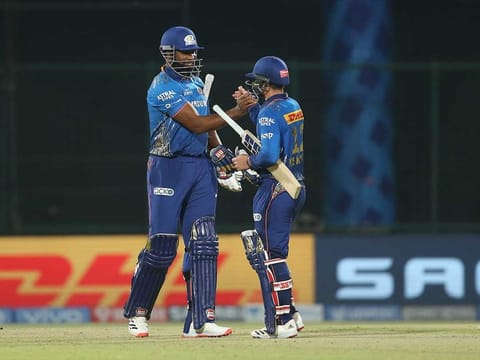 Quinton de Kock and Kieron Pollard of Mumbai Indians celebrate the win.