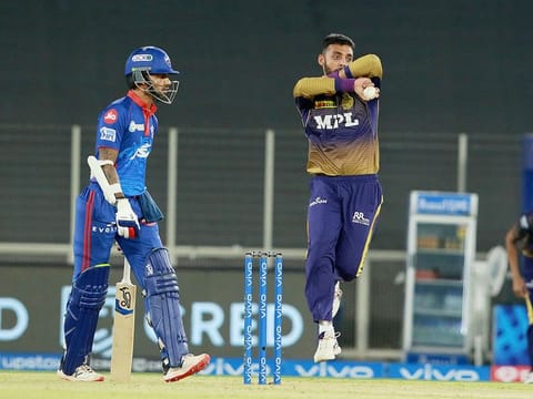 Varun Chakravarthy of Kolkata Knight Riders bowls. 