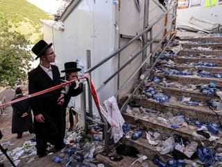 Photos: Stampede kills 44 pilgrims at Israel's largest COVID-era gathering