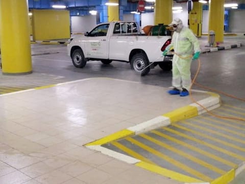 A worker at work in a parking area in Abu Dhabi. In Abu Dhabi, a dedicated team of inspectors, led by health and safety professionals, therefore got to work to ensure that worker residential areas in Abu Dhabi and Al Ain remained safe for their inhabitants during the pandemic. 
