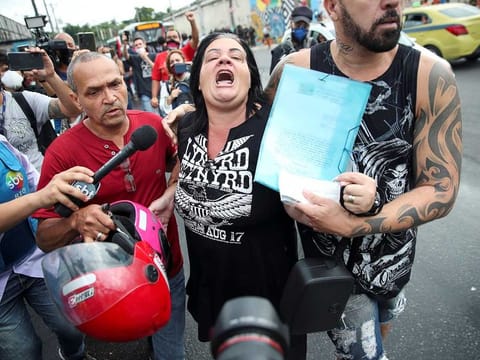 Adriana Santana de Araujo, 46, mother of Marlon Santana de Araujo, 23, one of the victims, reacts during a protest against police violence outside Jacarezinho slum, after a police operation which resulted in 25 deaths, in Rio de Janeiro, Brazil, May 7, 2021. 