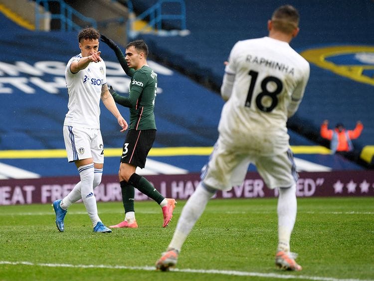 Leeds United's Rodrigo, left, and Raphinha celebrate against Tottenham