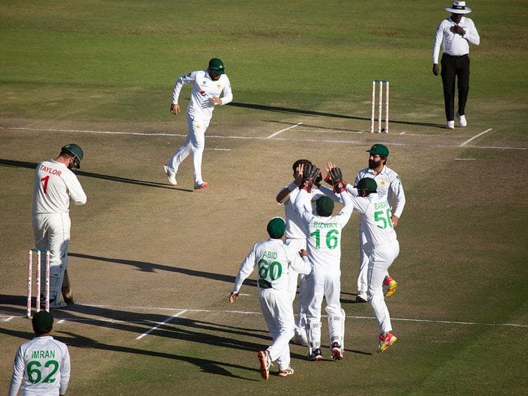 Pakistan players celebrate the wicket of Zimbabwean captain Brendan Taylor