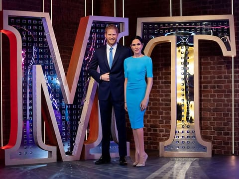 Figures of Britain's Prince Harry and Meghan, Duchess of Sussex, stand in their new position at Madame Tussauds. 
