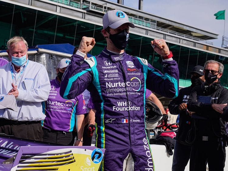 Romain Grosjean celebrates after winning the pole at Indianapolis Motor Speedway
