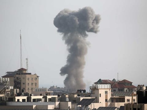 Smoke rises following an Israeli air strike in Gaza. 