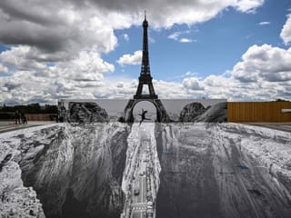 Photos: Optical illusion leaves Eiffel Tower teetering over ravine
