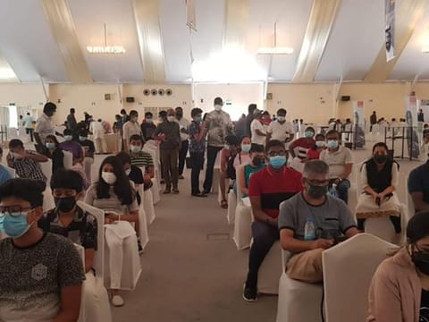 DPS Dubai students wait their turn to get the COVID-19 vaccine in Dubai