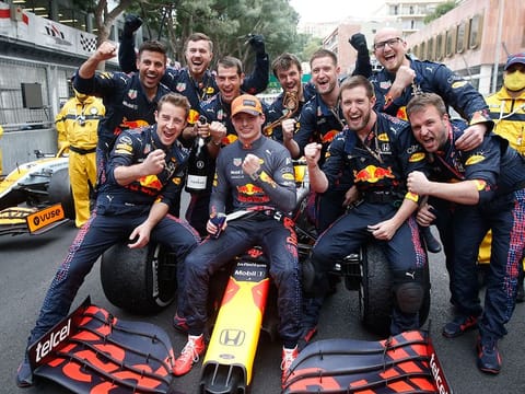 Red Bull driver Max Verstappen celebrates with his team after winning the Monaco Grand Prix 