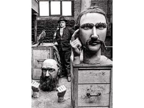 The giant heads of the North photographed by Robert Doisneau, around 1908