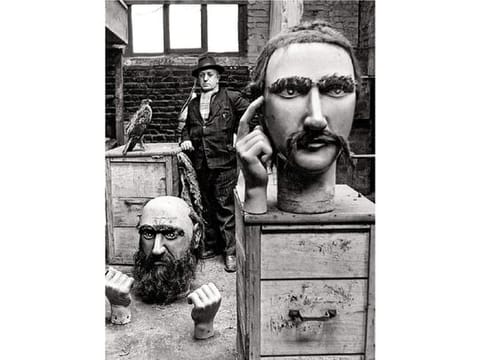 The giant heads of the North photographed by Robert Doisneau, around 1908